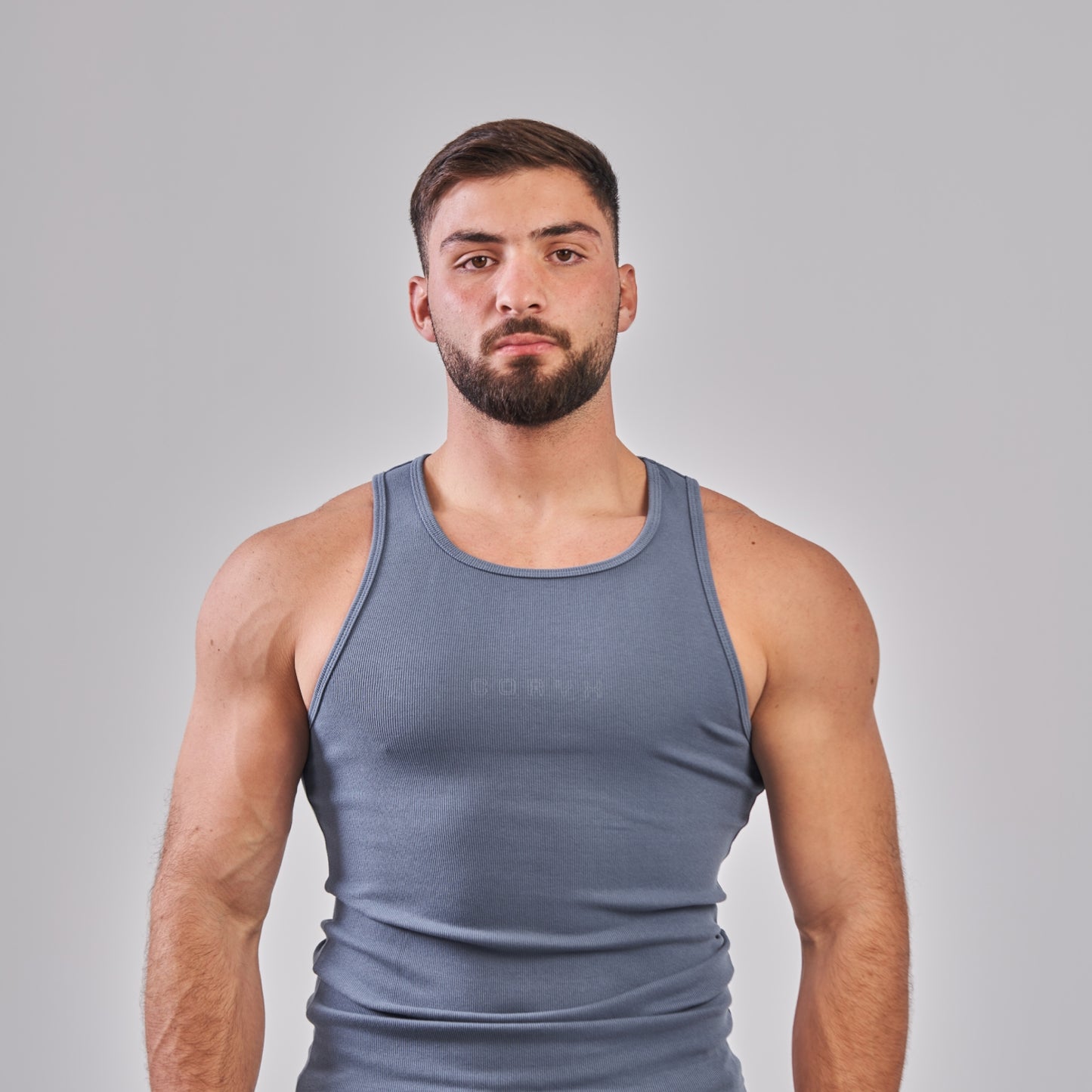 CORYX Tank gymwear highlighting stylish streetwear for fitness enthusiasts and urban fashion lovers