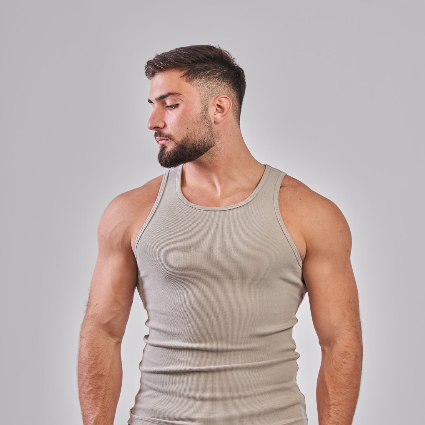 CORYX Tank gymwear highlighting stylish streetwear for fitness enthusiasts and urban fashion lovers